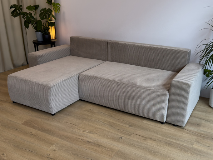 Czarna narożna kanapa sztruksowa z funkcją spania PLUSH L